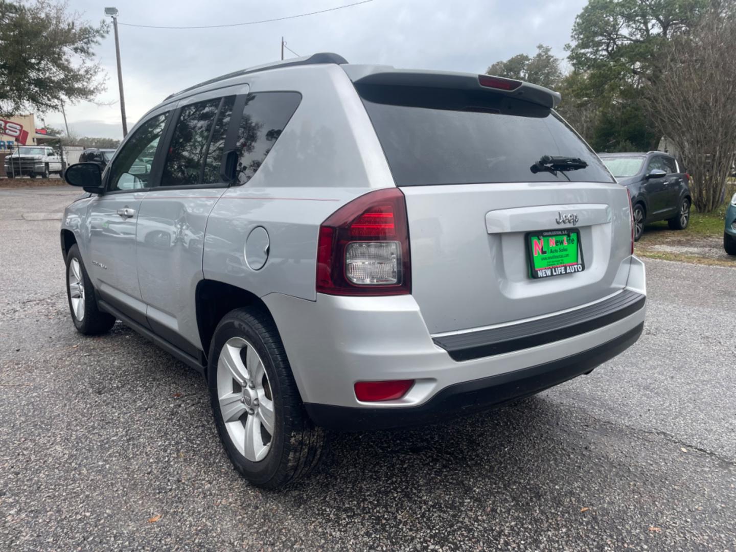 2012 SILVER JEEP COMPASS SPORT (1C4NJCBA8CD) with an 2.0L engine, Continuously Variable transmission, located at 5103 Dorchester Rd., Charleston, SC, 29418-5607, (843) 767-1122, 36.245171, -115.228050 - Spacious Interior with CD/AUX/AM/FM, Hands-free Phone, Power Windows, Power Locks, Power Windows, Power Mirrors, Keyless Entry, Alloy Wheels. Local Trade-in!! 108k miles Located at New Life Auto Sales! 2023 WINNER for Post & Courier's Charleston's Choice Pre-owned Car Dealer AND 2018-2024 Top 5 Fin - Photo#4